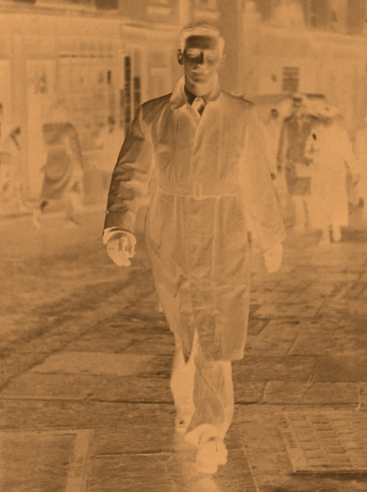 Stage 1: a Kodak Disc frame as the film holds it — an inverted colour negative with an orange mask